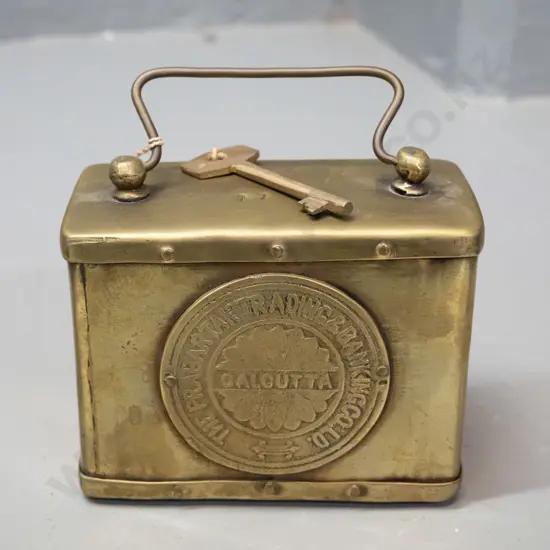 small Indian brass money box with key - medallion stamped Prabartak Trading & Banking Co. Ltd. H-80 W-105 D-50