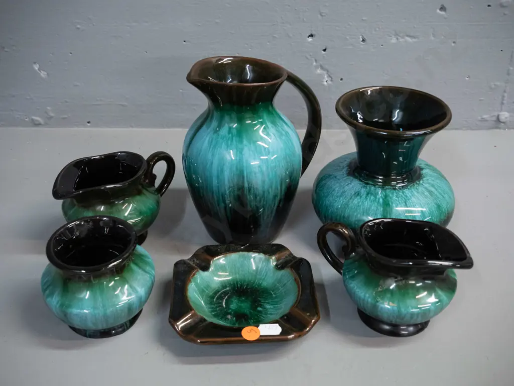 6 pieces of Blue Mountain teal pottery - 2 vases, 3 jugs and an ashtray - largest jug H-170 has some chips on rim Image 1++