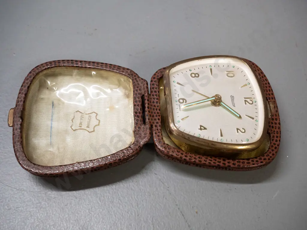 collection of 5 vintage clamshell travel alarm clocks - Equity, Blessing, Junghans and 2 Rhythm Image 1++