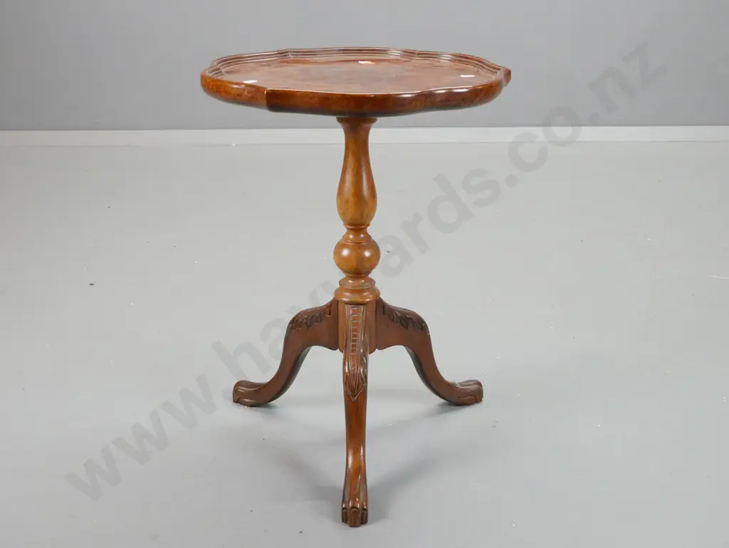 reproduction dished walnut-topped wine table with turned mahogany base with 3 shaped and carved feet - rubbing and some Image 1++