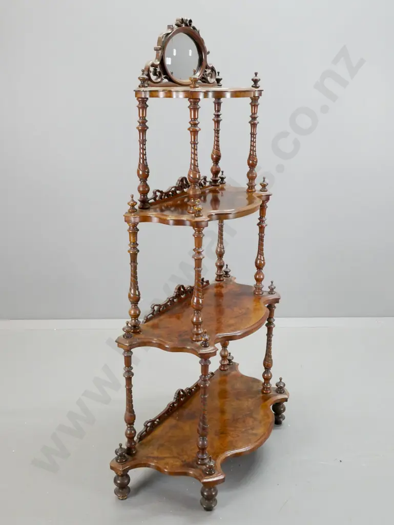 Victorian walnut 4-tier whatnot with serpentine shape fronts, twist turned supports with finials, oval mirror and Image 1++