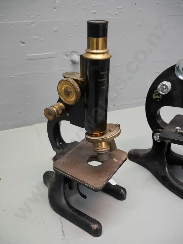 2 vintage laboratory microscopes - one marked George Wilton & Co Wellington / Chapman & Alldridge / Otago University Image 1++