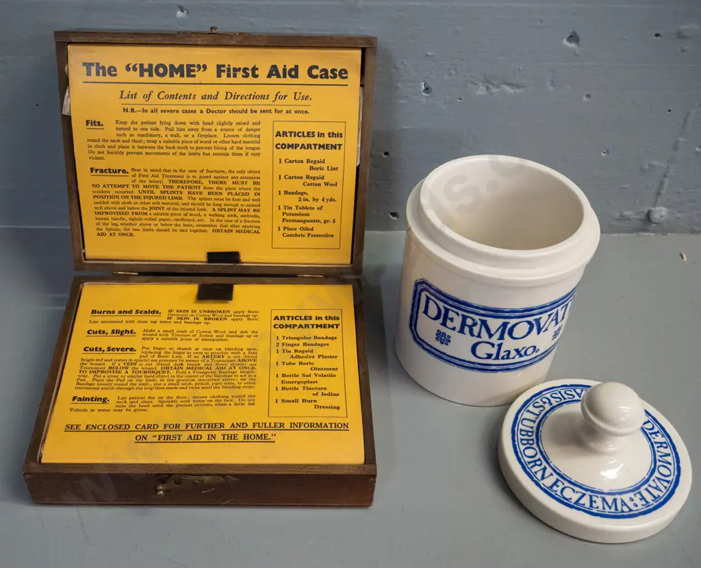 vintage Boots Drug Co. home first aid kit including original contents and a Wade porcelain Glaxo Dermavate lidded pot Image 1++