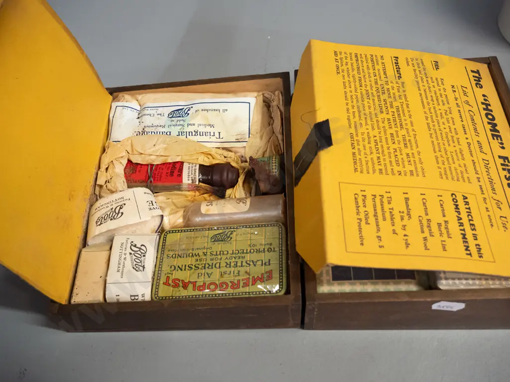 vintage Boots Drug Co. home first aid kit including original contents and a Wade porcelain Glaxo Dermavate lidded pot Image 1++