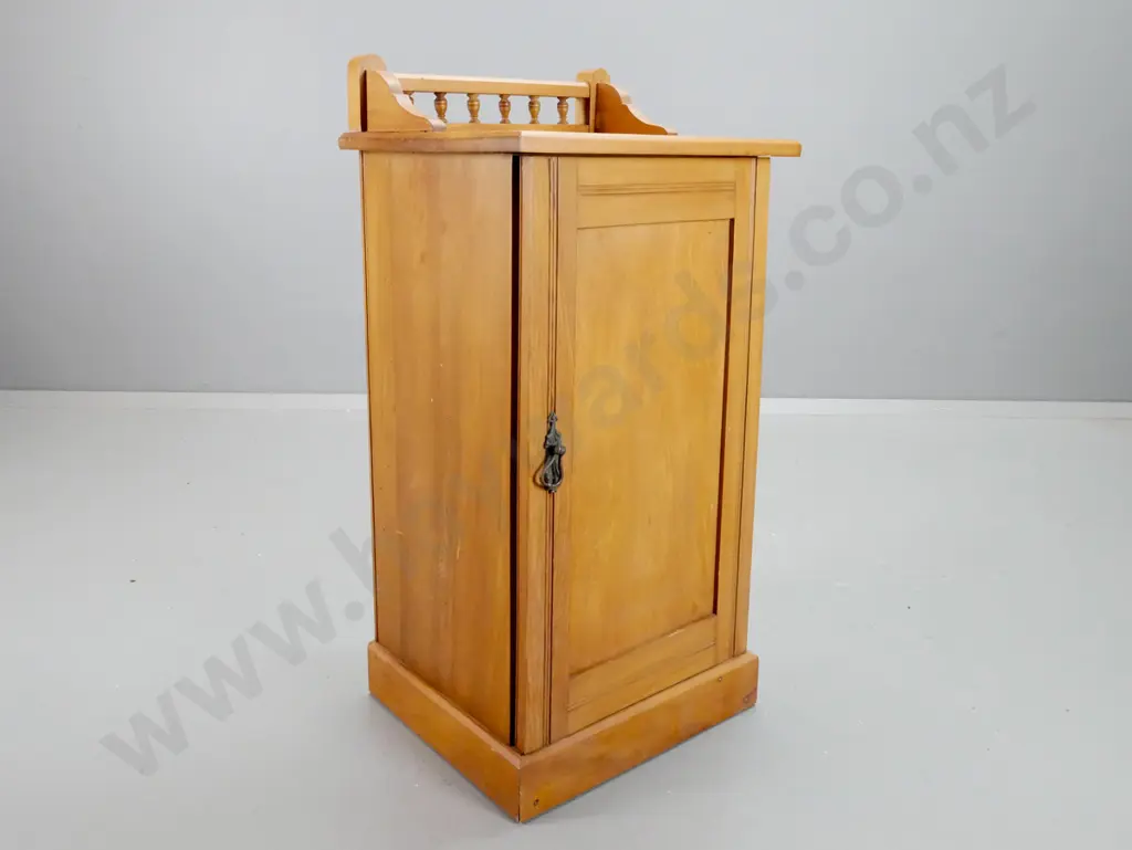 vintage rimu bedside cabinet with shaped gallery and turned spindles, panelled door with metal drop handle, one shelf, Image 1++