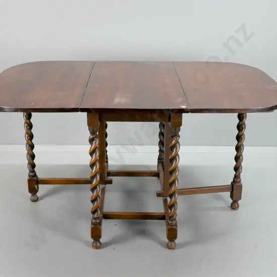 vintage oak drop-side gate leg table on stretcher base with Jacobean twist legs - some staining and scratching,