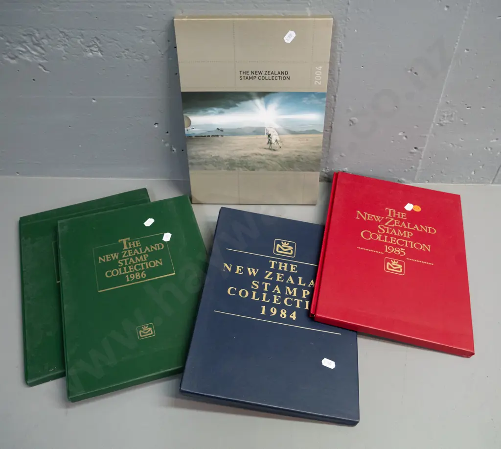 5 New Zealand stamp annual collector's albums - 1984, 1985, 1986 x 2 and 2004 Image 1++