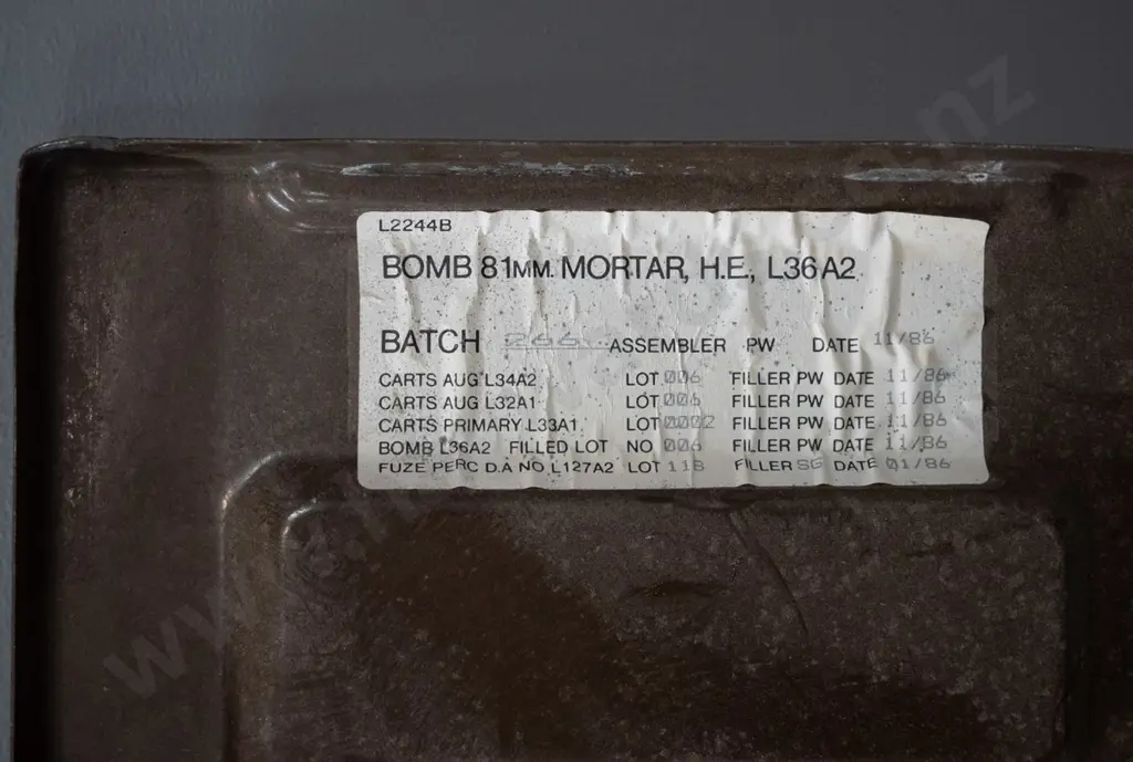 ammunition case with assorted 1986 mortar shell impressed and printed info - has bent latch, scratches and dents. H-270 Image 1++