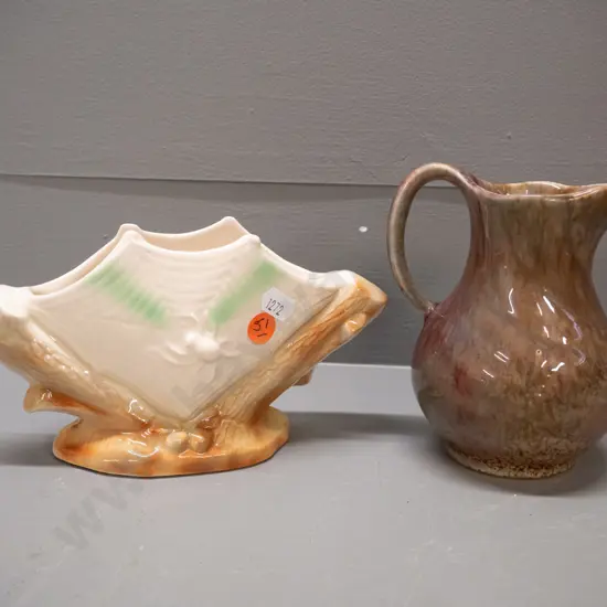 2 pieces of New Zealand pottery - (Crown Lynn?) jug marked 51. on base and a Titian Ware spider web vase marked T104.