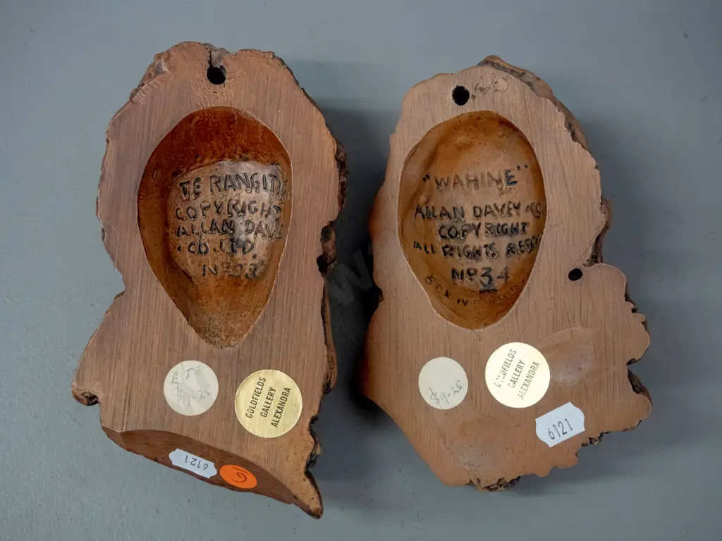 2 faux timber composite Maori motif wall heads - Marked Alan Davey, Te Rangatira No. 23 and Wahine No. 34 - approx H-155 Image 1++