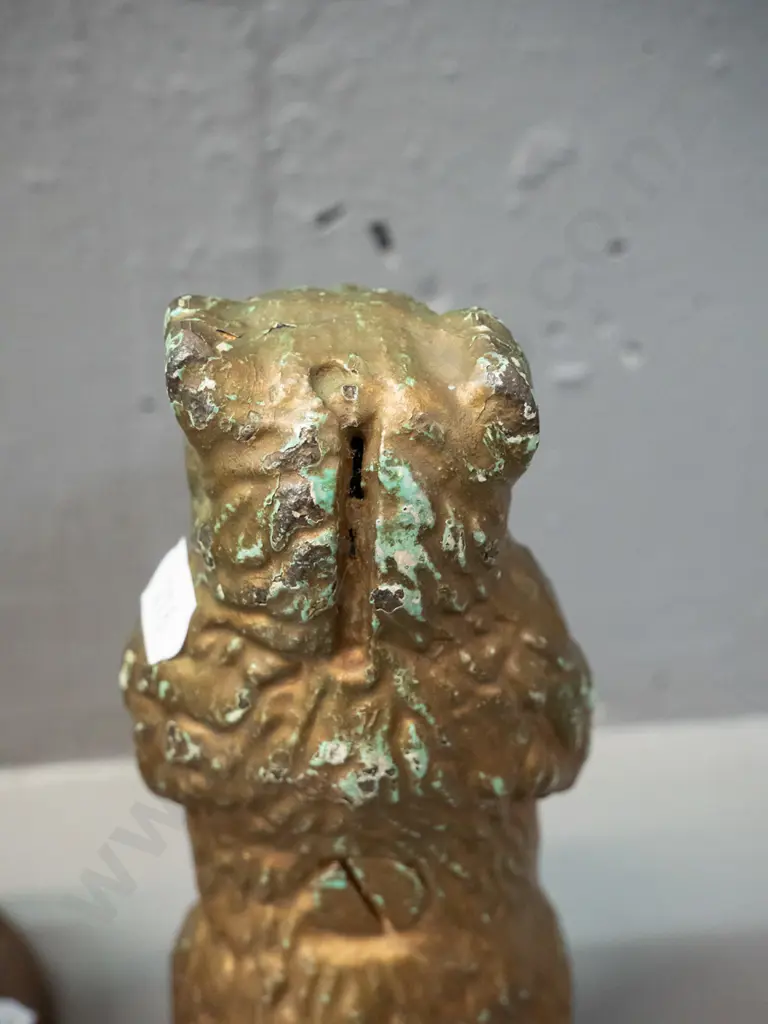 cast brass 2-piece standing bear money box and two cast brass double leaping dolphin figurines. Bear has chipped gilt Image 1++