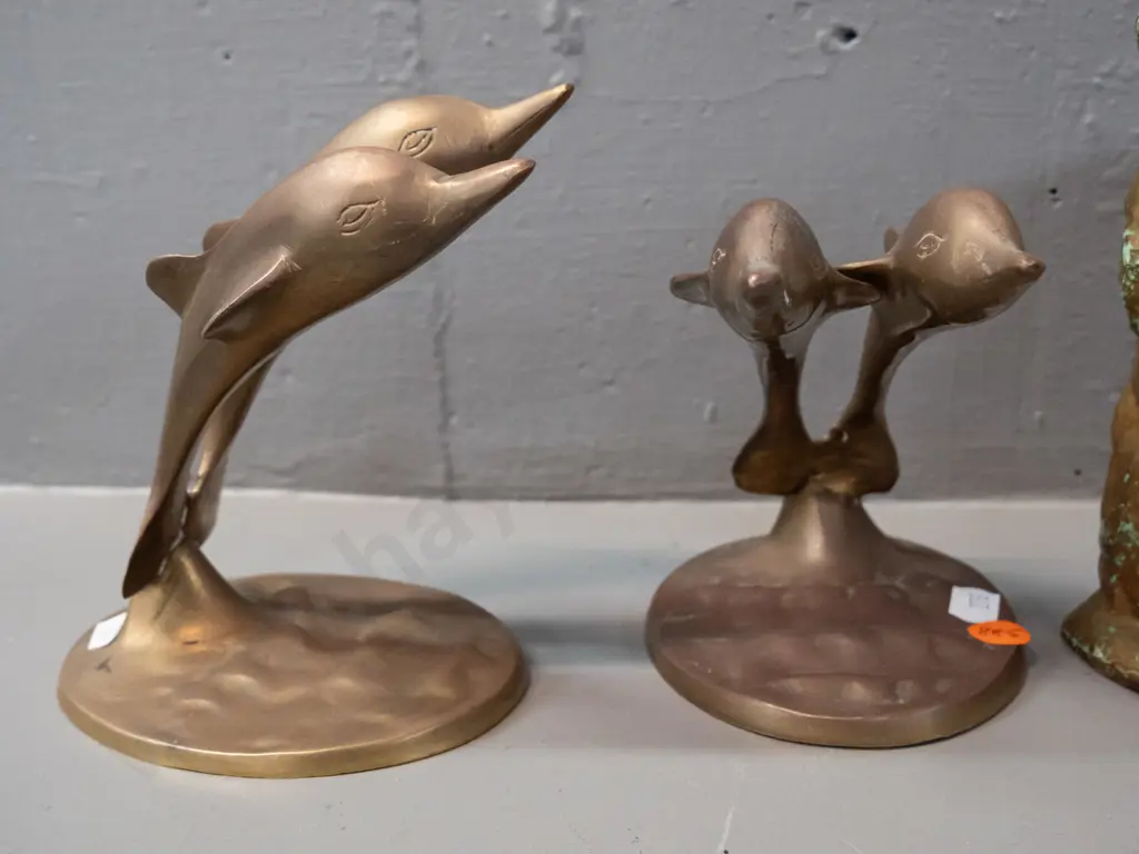 cast brass 2-piece standing bear money box and two cast brass double leaping dolphin figurines. Bear has chipped gilt Image 1++