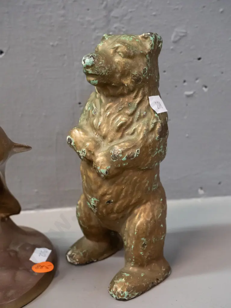 cast brass 2-piece standing bear money box and two cast brass double leaping dolphin figurines. Bear has chipped gilt Image 1++