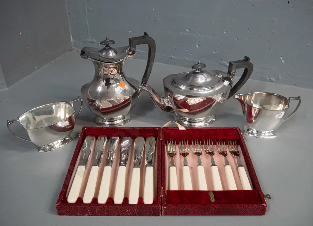 silver plated tea & coffee set with bakelite handles and a boxed set of ivorine-handled fish knives & forks. Coffee pot Image 1++