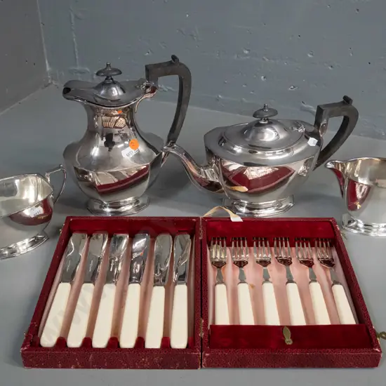 silver plated tea & coffee set with bakelite handles and a boxed set of ivorine-handled fish knives & forks. Coffee pot