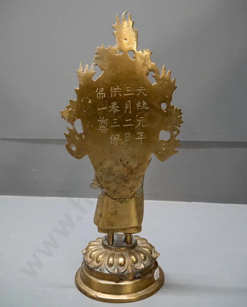 asian brass standing figure on lotus flower with pierced back piece - may have some loss to decoration on right side of Image 1++