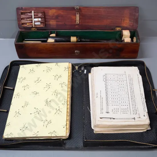 bagpipe pieces in pine case with a leather satchel of bagpipe sheet music - box is W-515