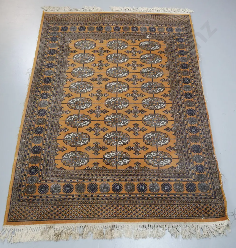 Persian style wool floor rug with "Keshan" label - mustard, dark blue and ivory with knotted fringe - staining, fraying Image 1++