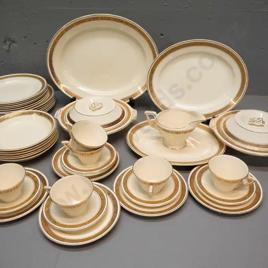 Burleigh ware cream & gilt 6 place dinner set with 3 ashetts, 2 lidded vegetables, gravy jug, cups & saucers, 3 plate