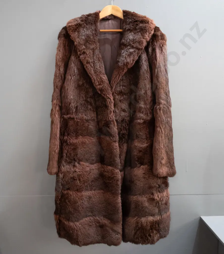 full length dark reddish brown fur coat with Mooney's Made in New Zealand label Image 1++