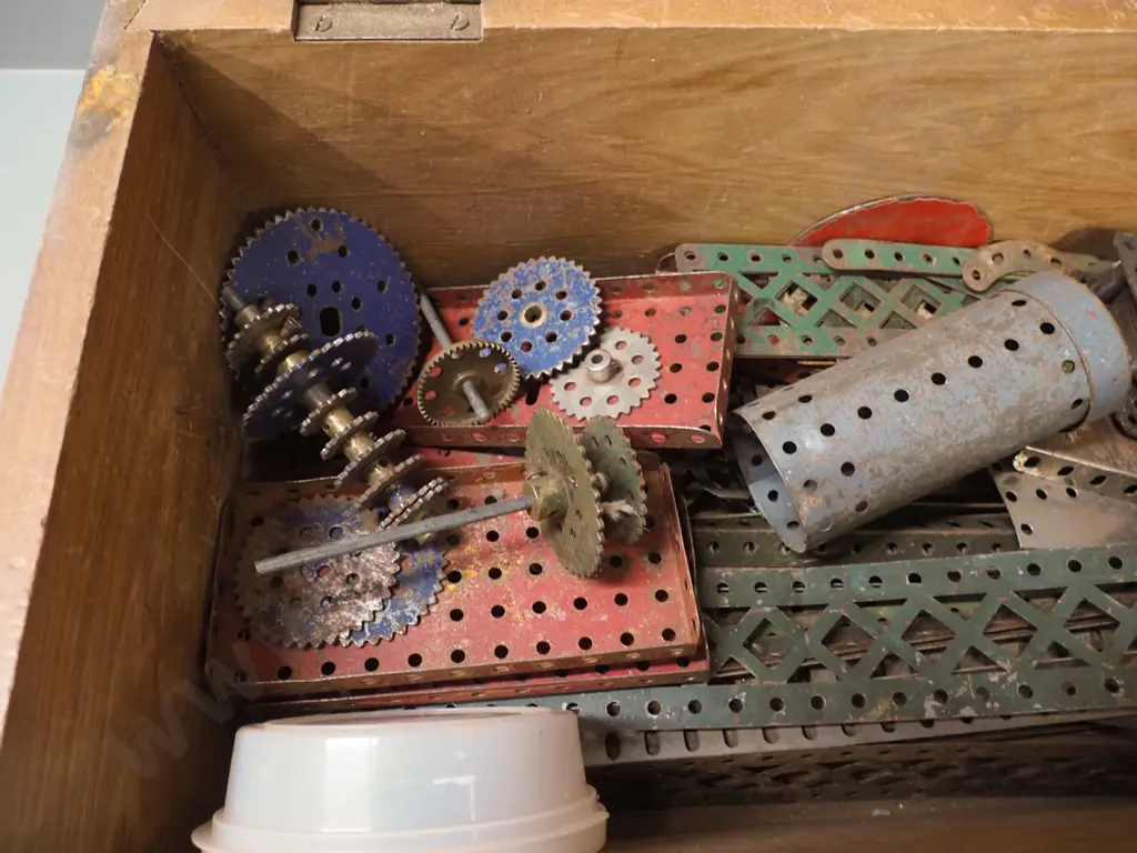 wooden chest and small segmented tray of vintage Meccano pieces in very play-worn condition. Chest H-230 W-460 D-235 Image 1++