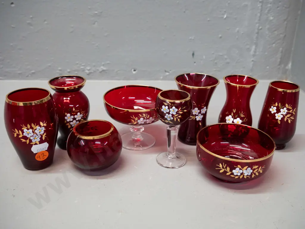 9 small pieces of Bohemian ruby glass with enamel floral motifs and gilt rims - label to base of one, tallest is H-85 Image 1++