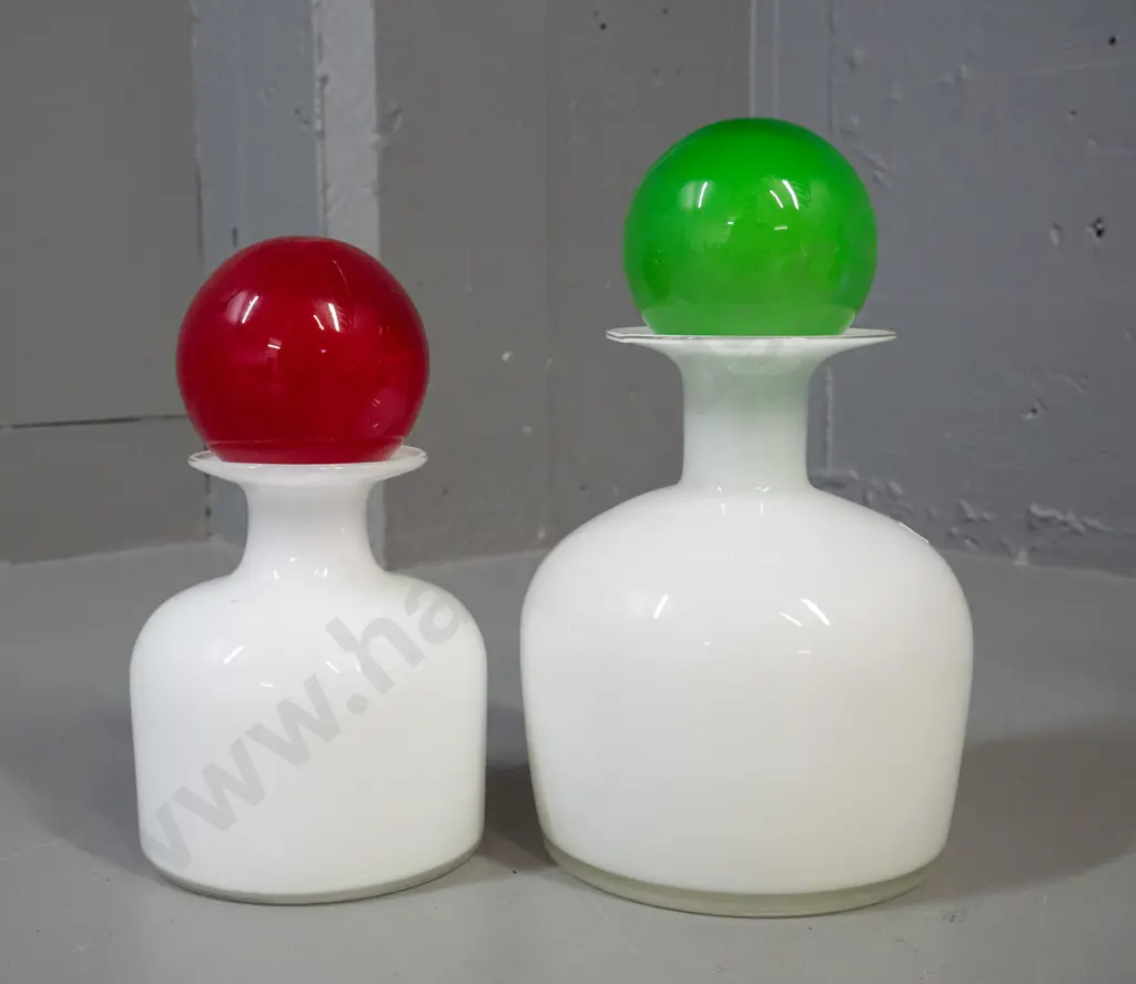 2 white glass decanters with hollow ball stoppers - stoppers are same, one red & one green, larger decanter H-240 Image 1++
