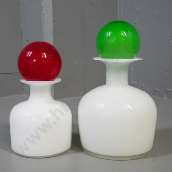 2 white glass decanters with hollow ball stoppers - stoppers are same, one red & one green, larger decanter H-240