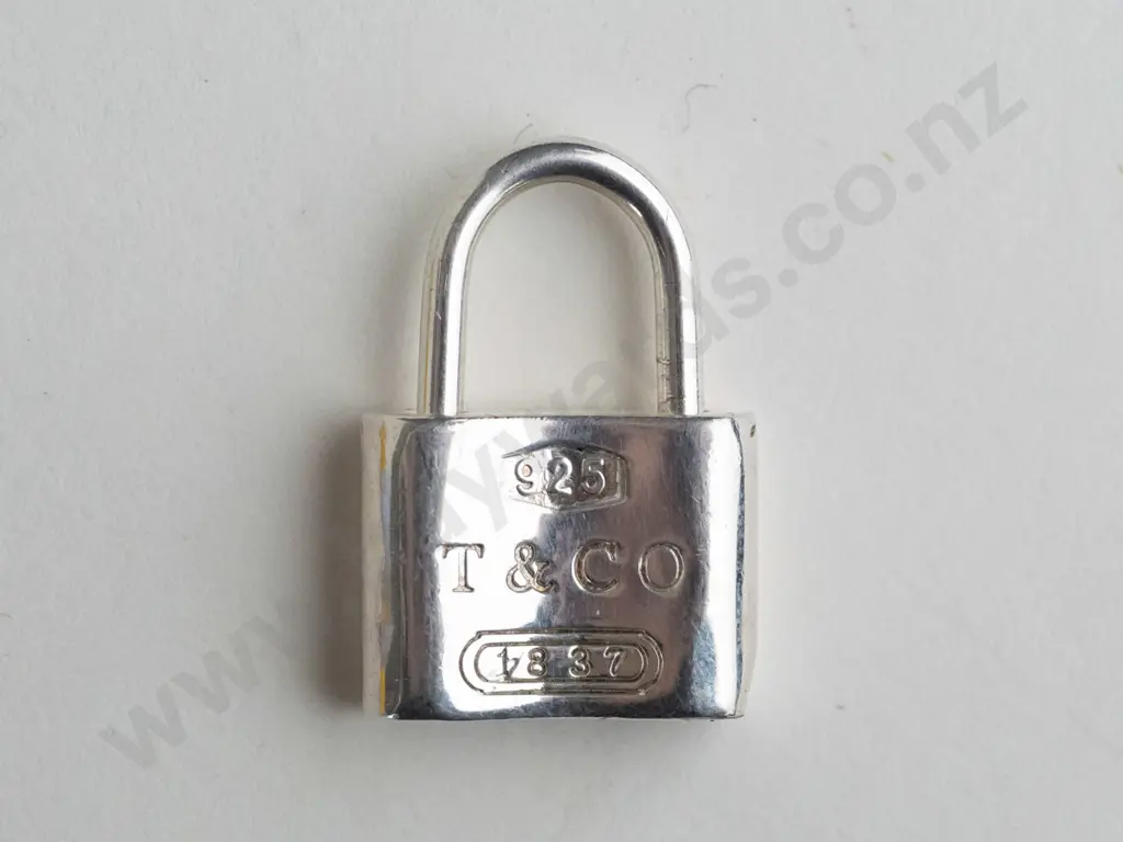 silver padlock charm stamped 925 T & Co 1837 Image 1++