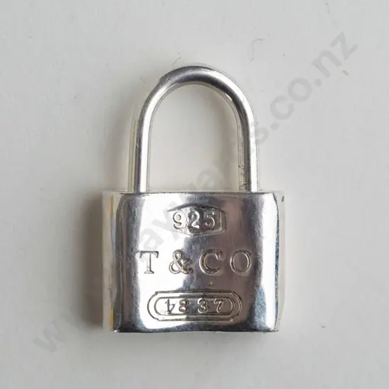 silver padlock charm stamped 925 T & Co 1837