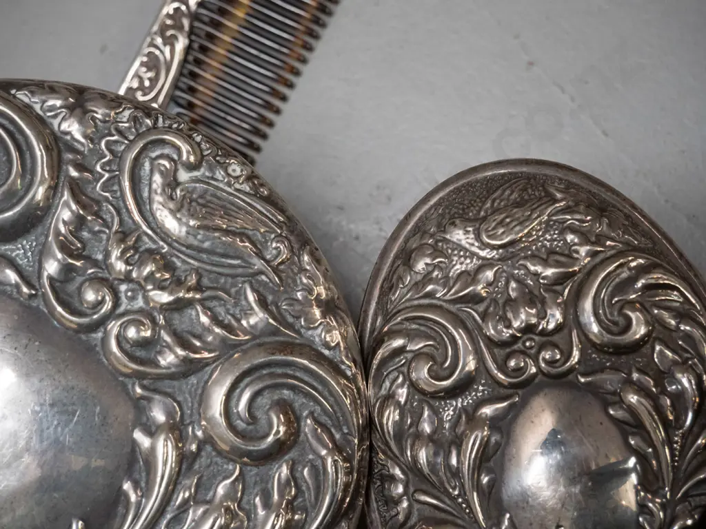 3 piece sterling silver mounted dressing table set - bevelled round mirror, brush and comb - with bird and "green man" Image 1++