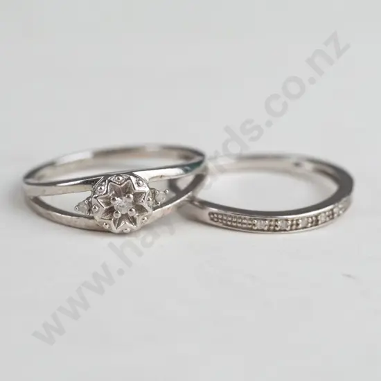 2 silver rings both stamped 925