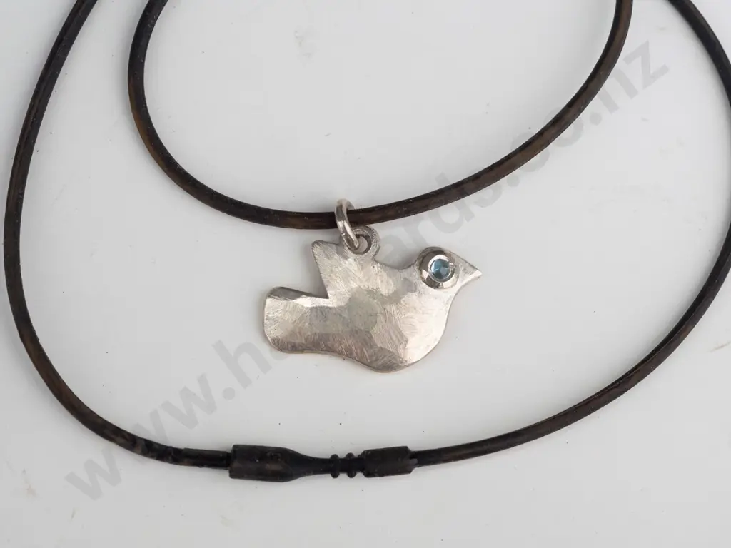 silver bird pendant on black strand stamped stg 925 Image 1++