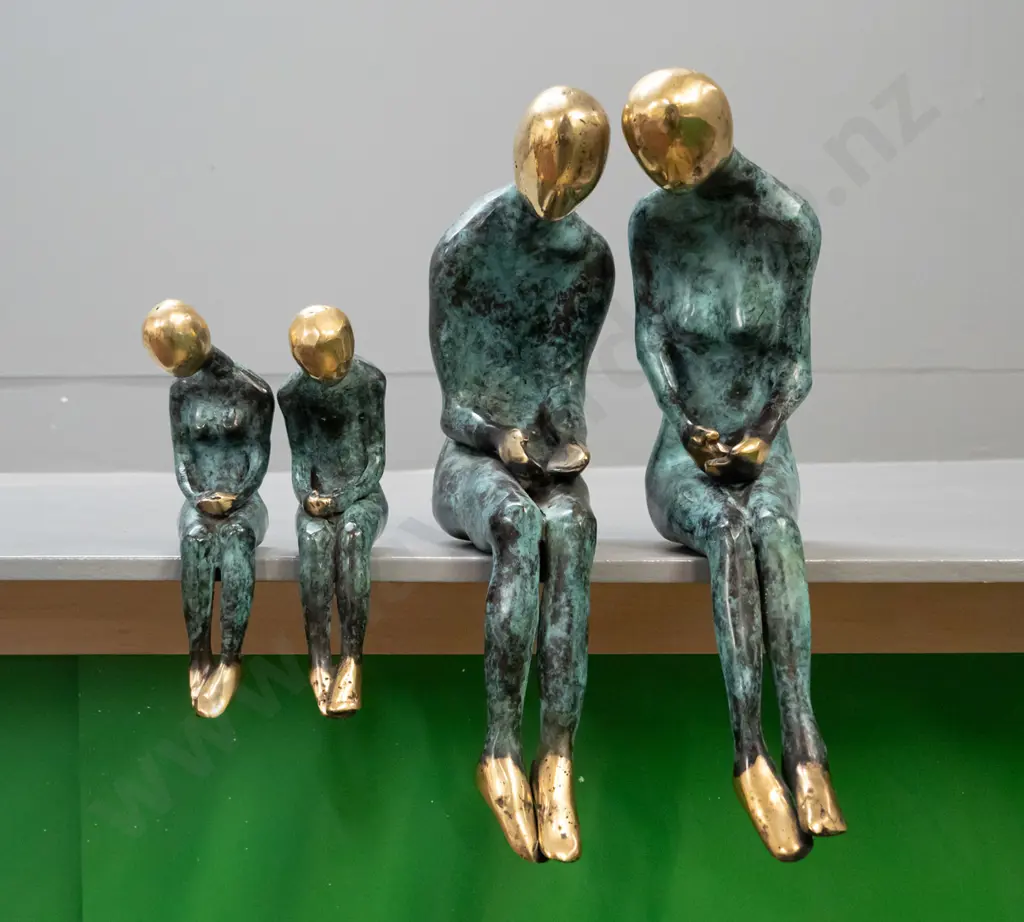 brass shelf-edge seated figures with patinated finish - 2 male and female pairs, larger is H-295 Image 1++