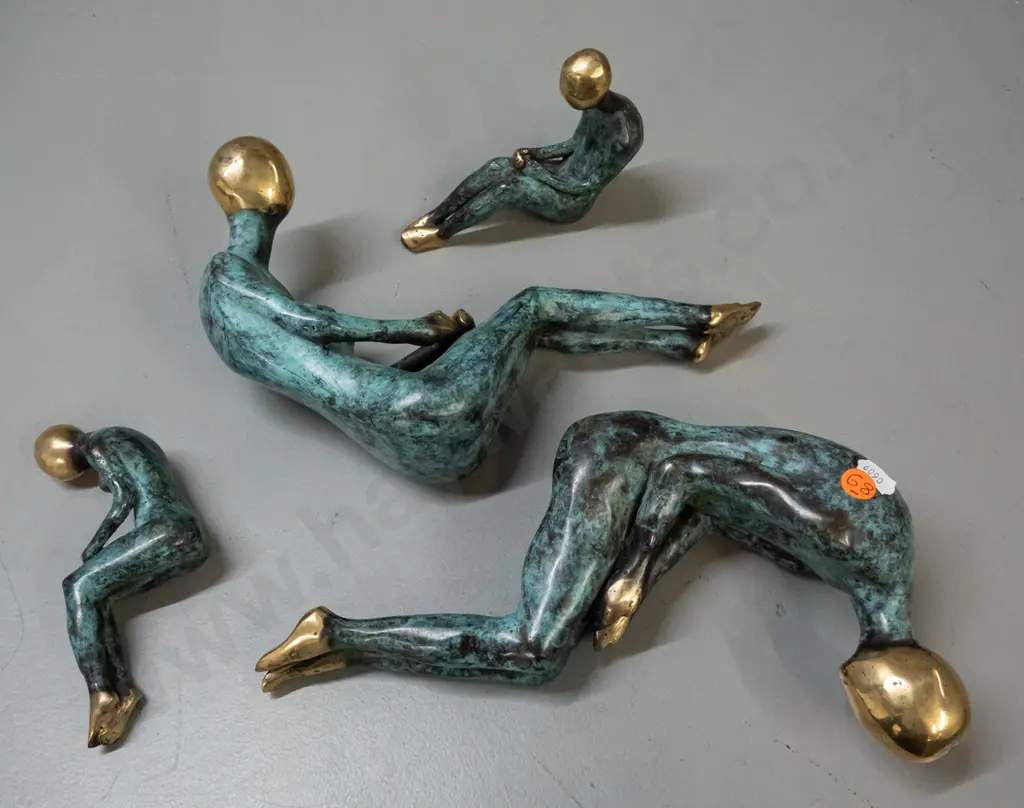 brass shelf-edge seated figures with patinated finish - 2 male and female pairs, larger is H-295 Image 1++