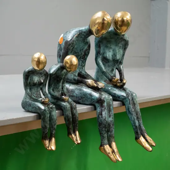 brass shelf-edge seated figures with patinated finish - 2 male and female pairs, larger is H-295