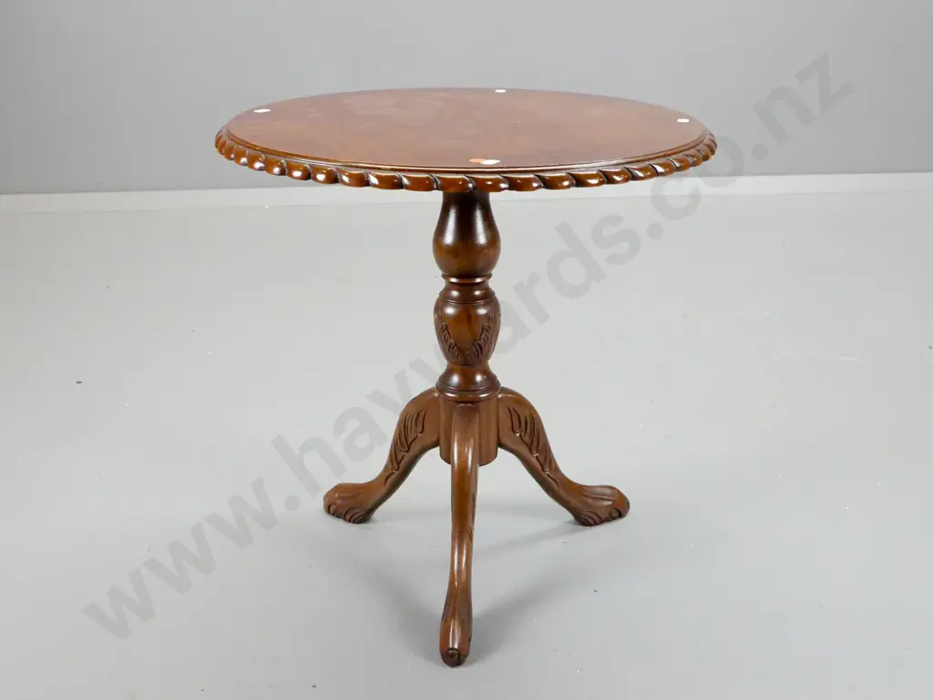 round top walnut veneer wine table with shaped edge, turned and carved 3-point column base - some staining to top and Image 1++