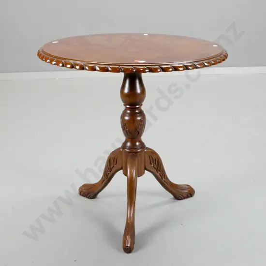 round top walnut veneer wine table with shaped edge, turned and carved 3-point column base - some staining to top and