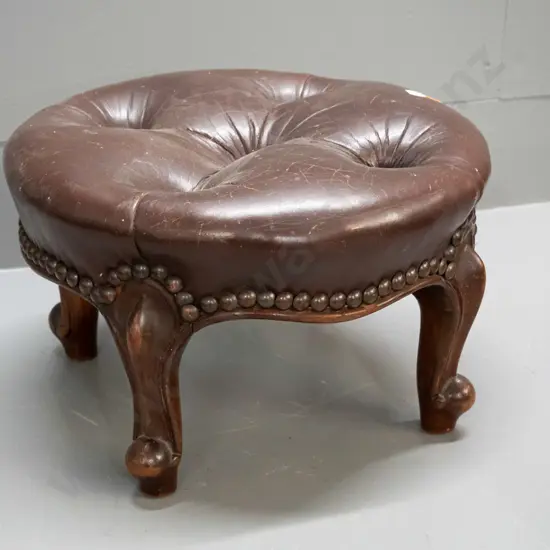 vintage mahogany foot-stool with deep button and studded leather top, some staining and wear to leather H-200 W-320