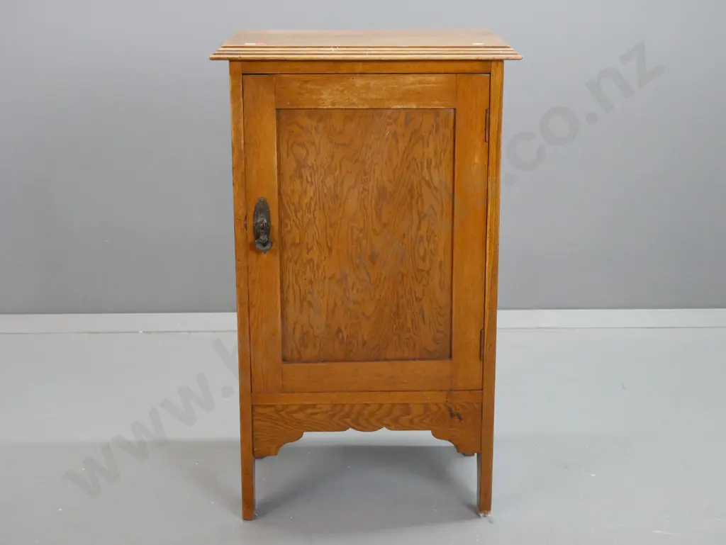 vintage oak single door bedside cabinet w/ metal drop handle - borer to bottom plate, some stains on top surface. H-820 Image 1++