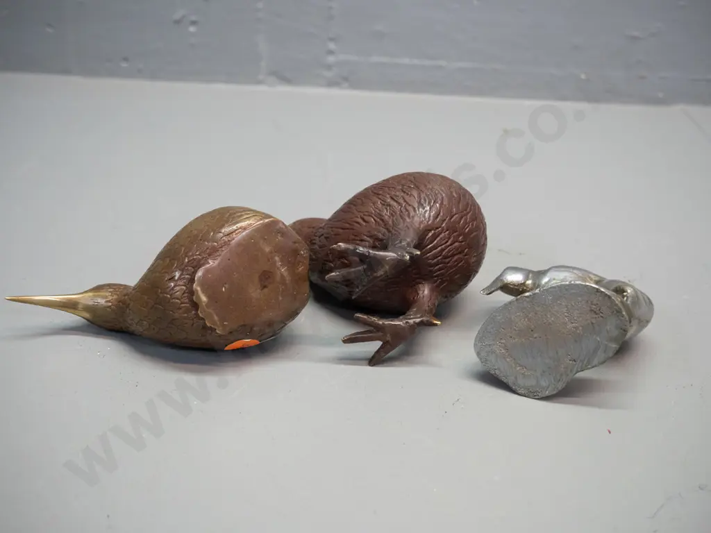 3 metal kiwi bird figures - 2 brass, one with bronze finish is H-100 L-140, and a crudely cast silver metal Image 1++