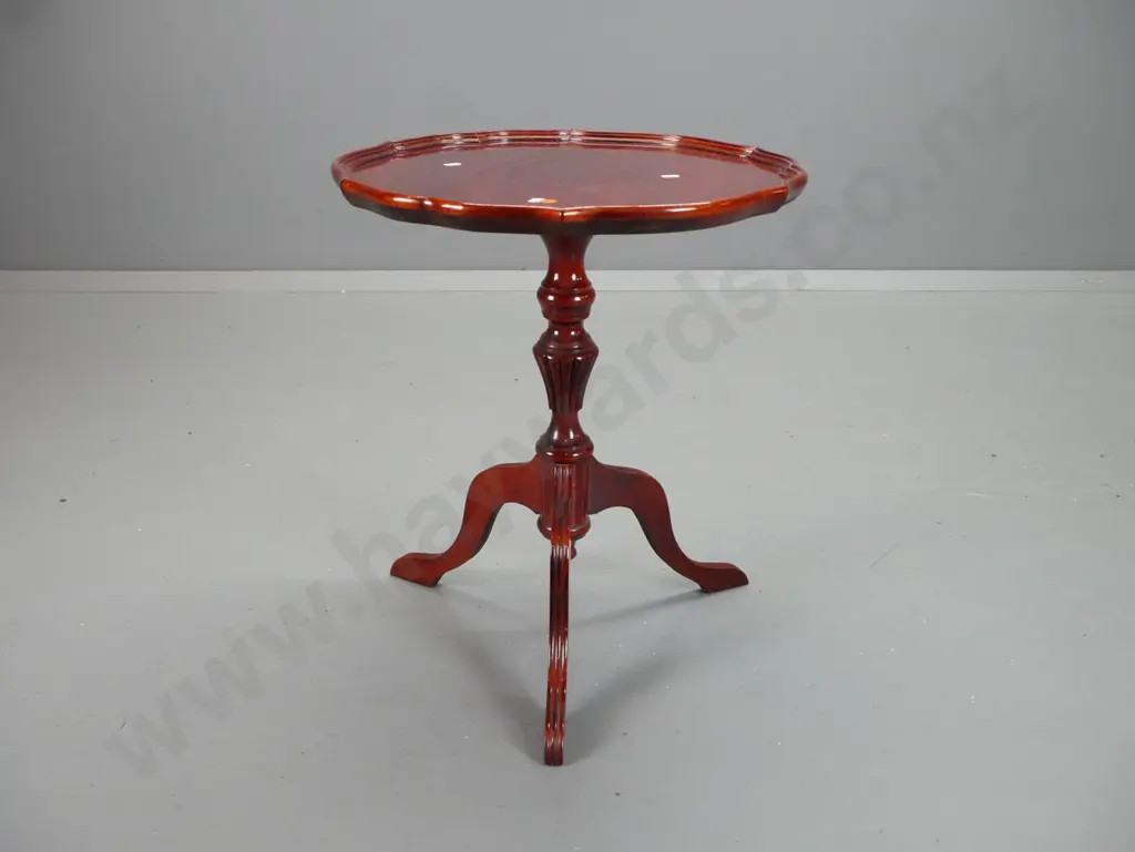 vintage mahogany wine table with scalloped shaped top, fluted turned base on 3 scrolling legs - some scratches to top. Image 1++