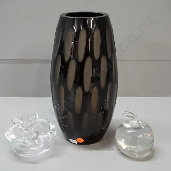 3 pieces of glass - black over amber art glass vase with cut ovals, French clear glass apple shaped dish and an apple