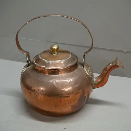 vintage copper kettle with brass rim and knob to top, hinged flap over spout - overall dents and wear H-270 with handle
