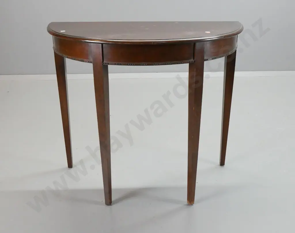vintage mahogany half-round hall table with 4 square tapered legs, applied decoration to front edge. Scratches and marks Image 1++