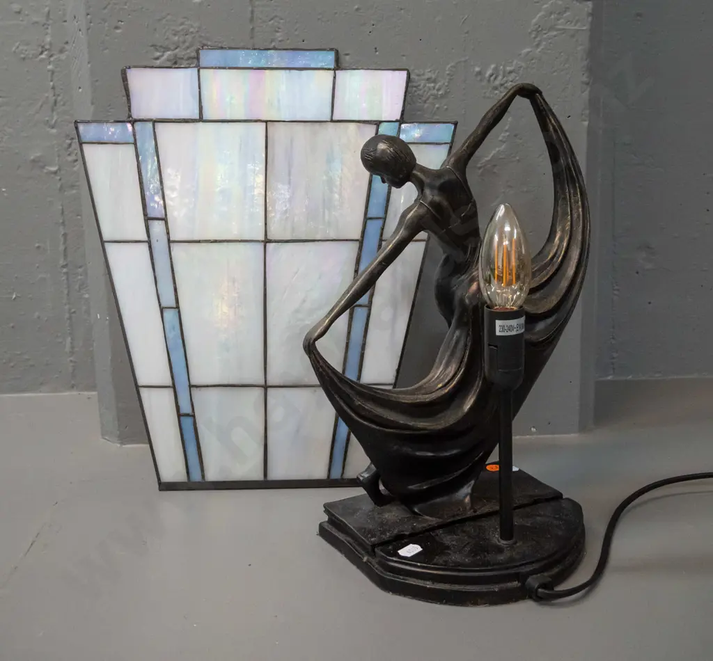 deco style table lamp with dancing woman, leadlight back panel sits in slot, base is composite with faux bronze finish Image 1++