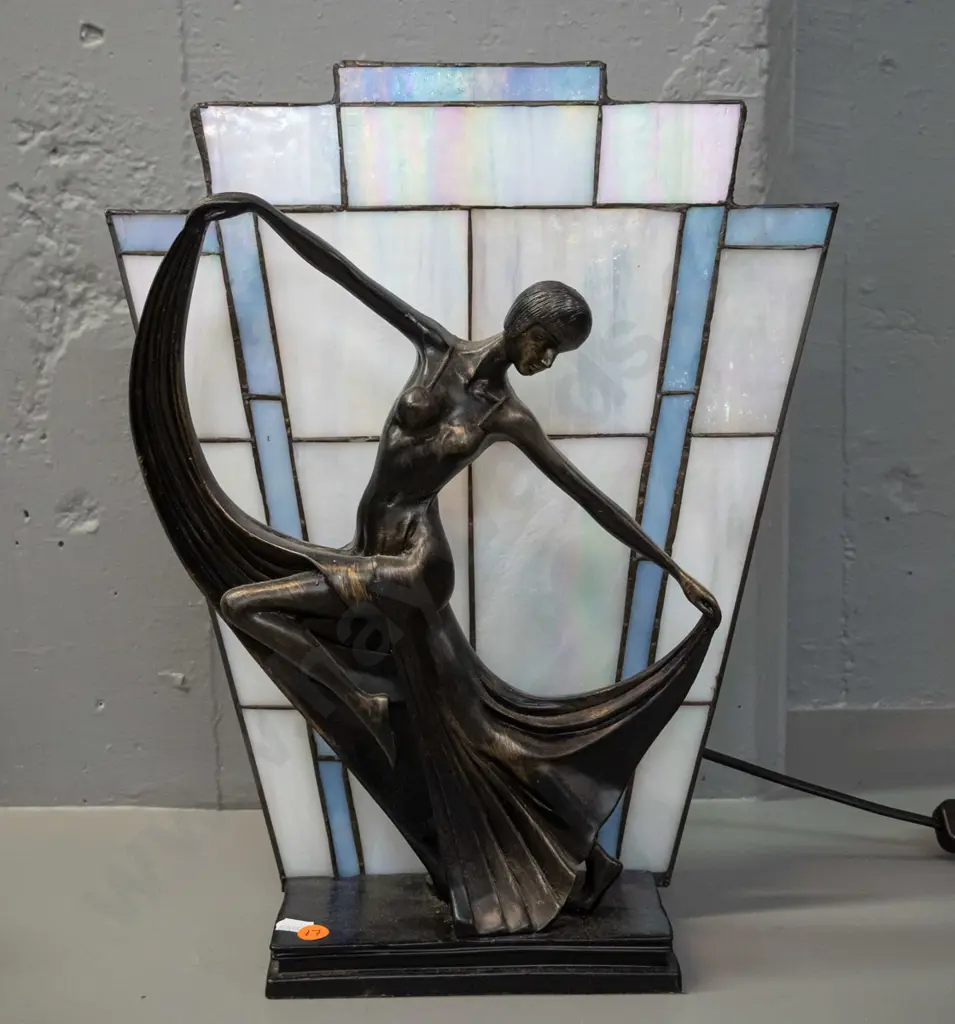 deco style table lamp with dancing woman, leadlight back panel sits in slot, base is composite with faux bronze finish Image 1++