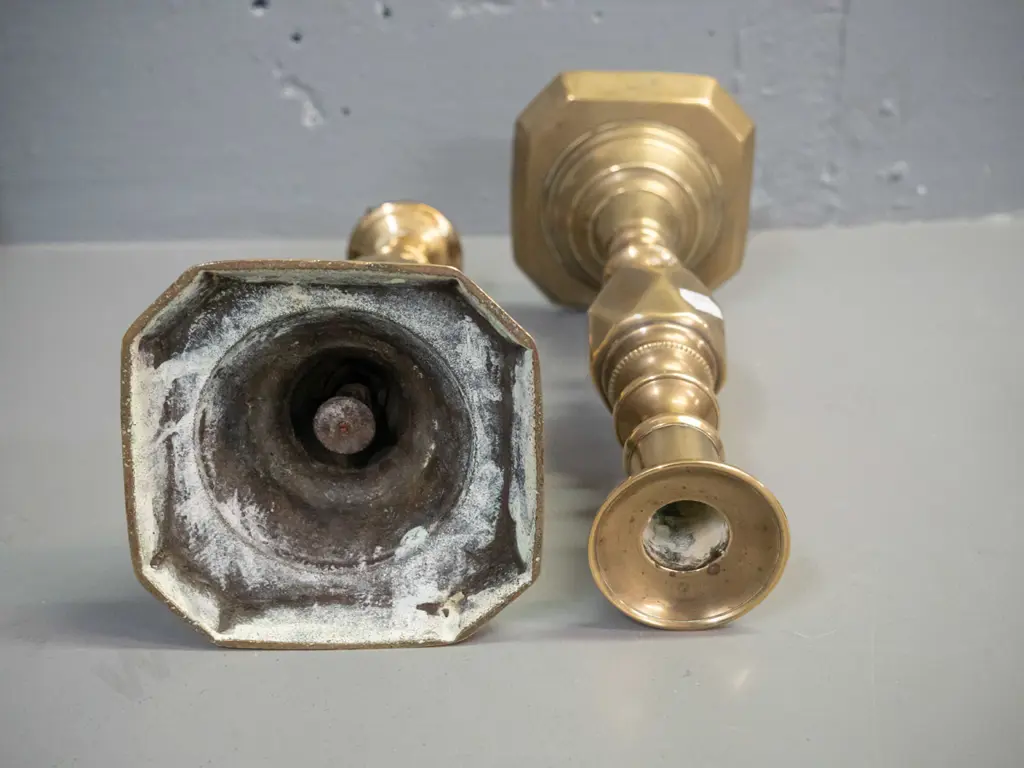 pair of Victorian brass candlesticks - marked The Diamond Princess, England. Split to base corner on one, other has Image 1++