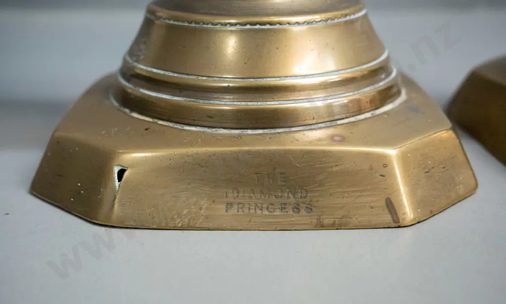 pair of Victorian brass candlesticks - marked The Diamond Princess, England. Split to base corner on one, other has Image 1++