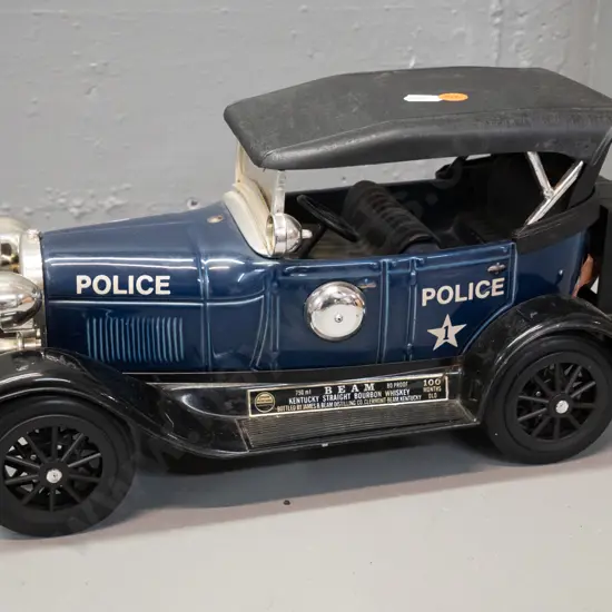 Jim Beam decanter - 1929 Model A police car, with contents, seal looks intact. H-180 L-390